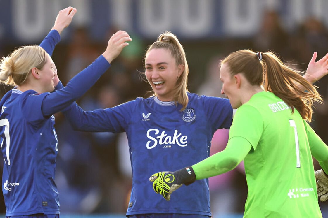 Megan Finnigan of Everton celebrates Megan Finnigan of Everton celebrates victory with teammates Lucy Hope and Courtney Brosnan after the Barclays Women's Super League match between Everton and Manchester City at Walton Hall Park on December 15, 2024 in Liverpool, England.