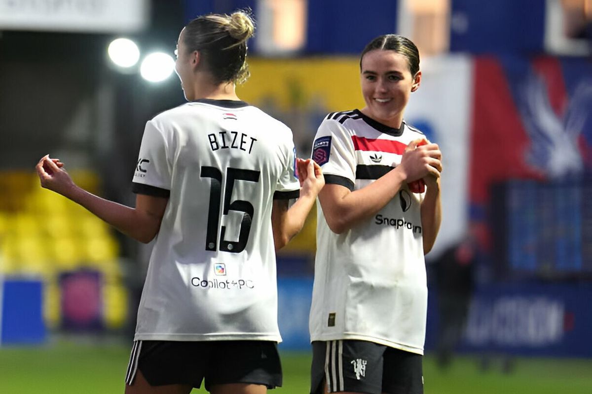 Grace Clinton Manchester United's Grace Clinton (right) celebrates with team-mate Celin Bizet Ildhusoy after victory in the Barclays Women's Super League match at the VBS Community Stadium, Sutton.
